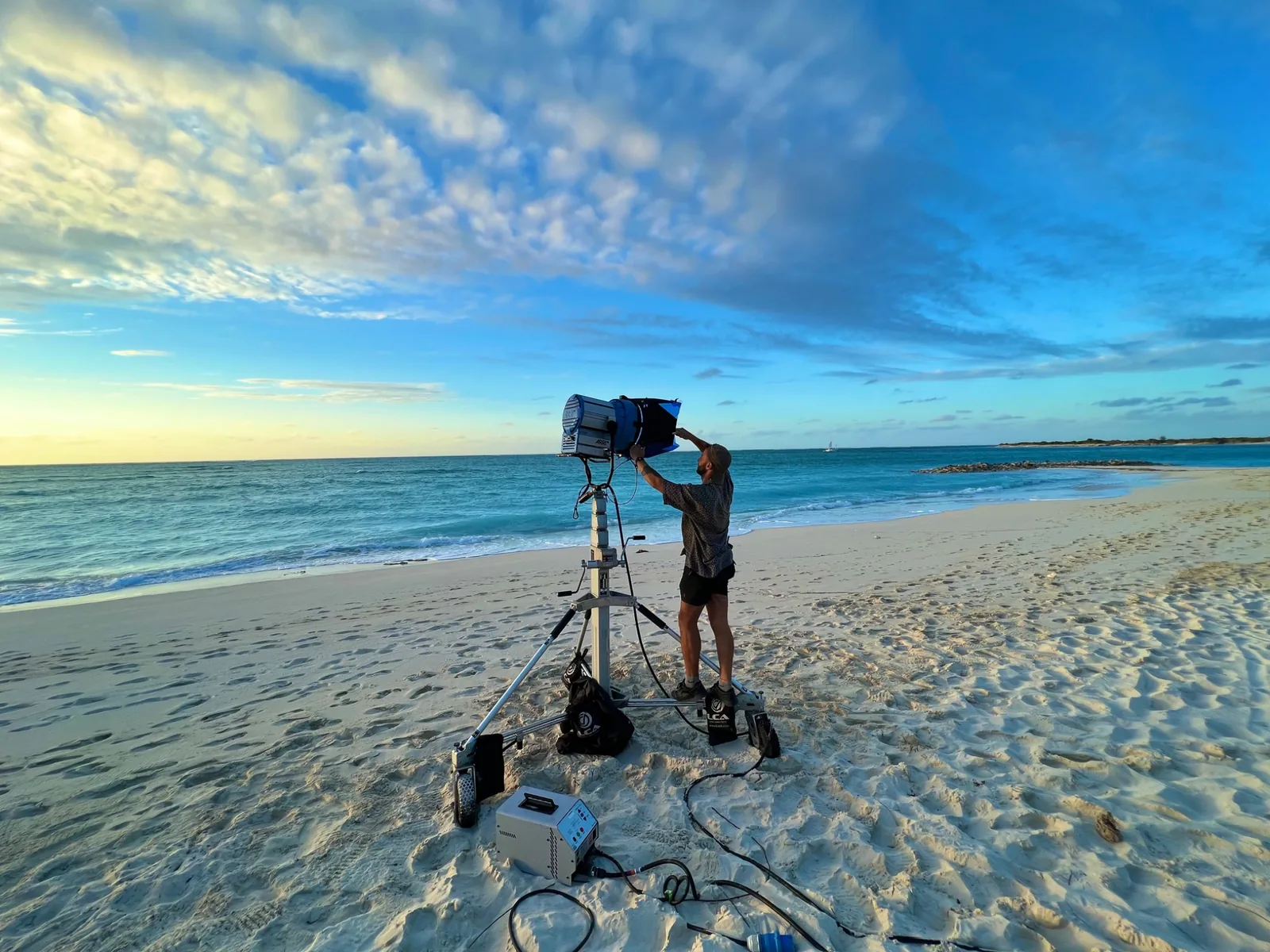 Location lighting setup on a Caribbean beach for Too Hot To Handle
